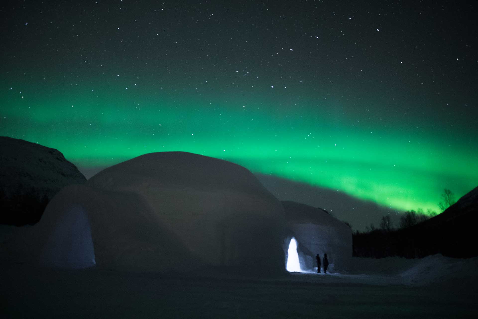 Photo. Ice dome under northern lights