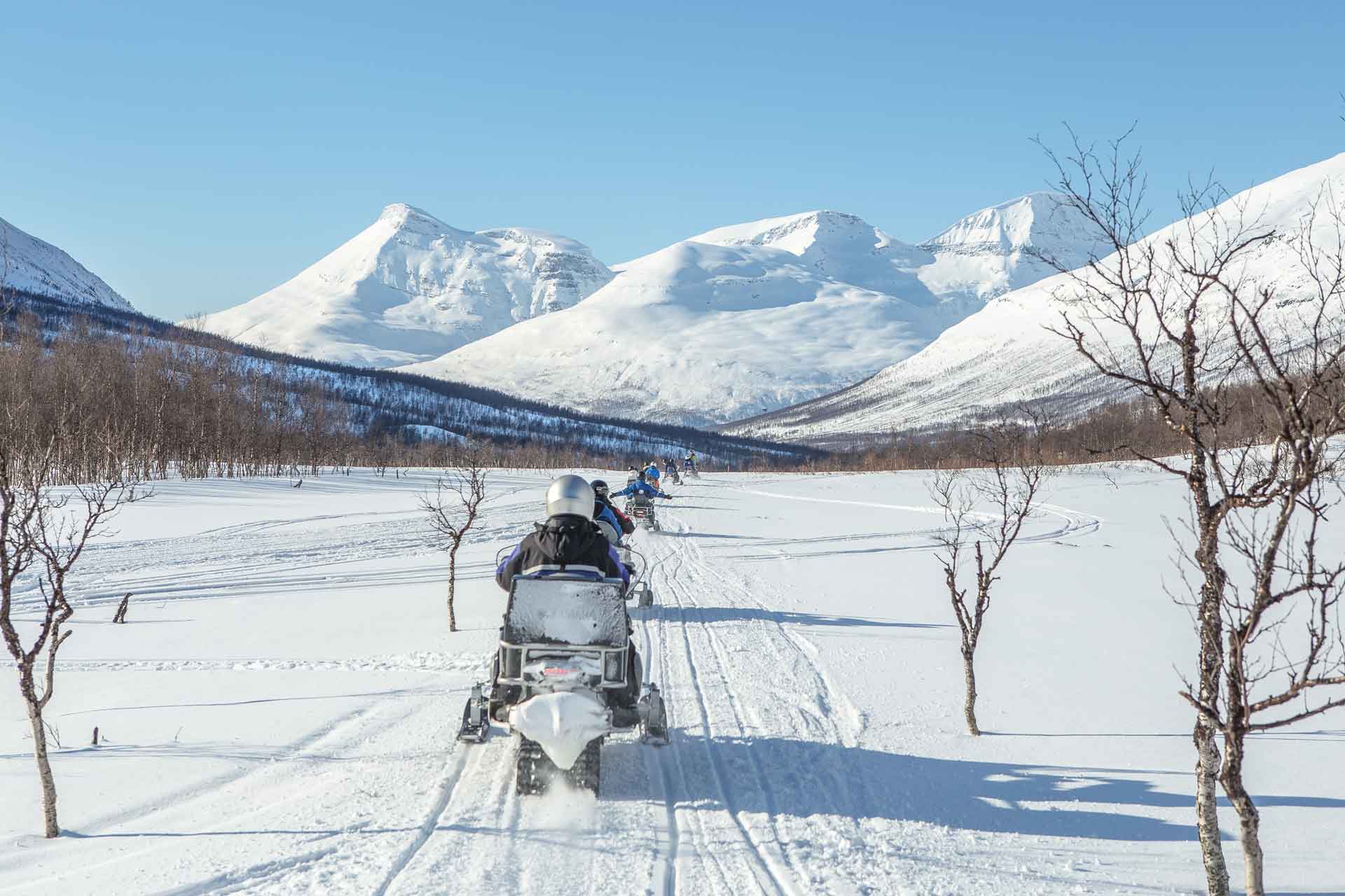 Photo. Snowmobile in winter landscape.